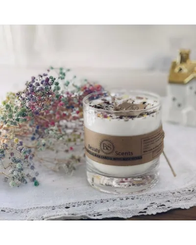 candela artigianale profumata in contenitore di vetro