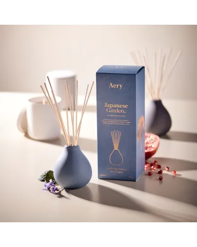 Minimal clay pots in neutral tones, filled with fantastically unique fragrance