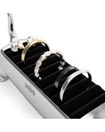 elegant munchkin cat-shaped ring holder in polished metal with velvet base