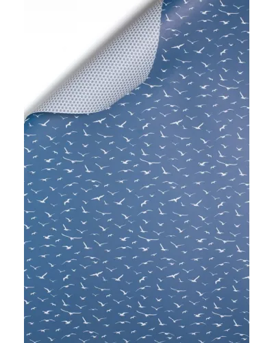 Double-sided gift wrapping paper with two matching patterns