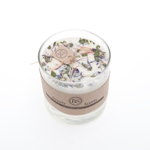 handmade ecological soy wax candle in the shape of heart with glass container