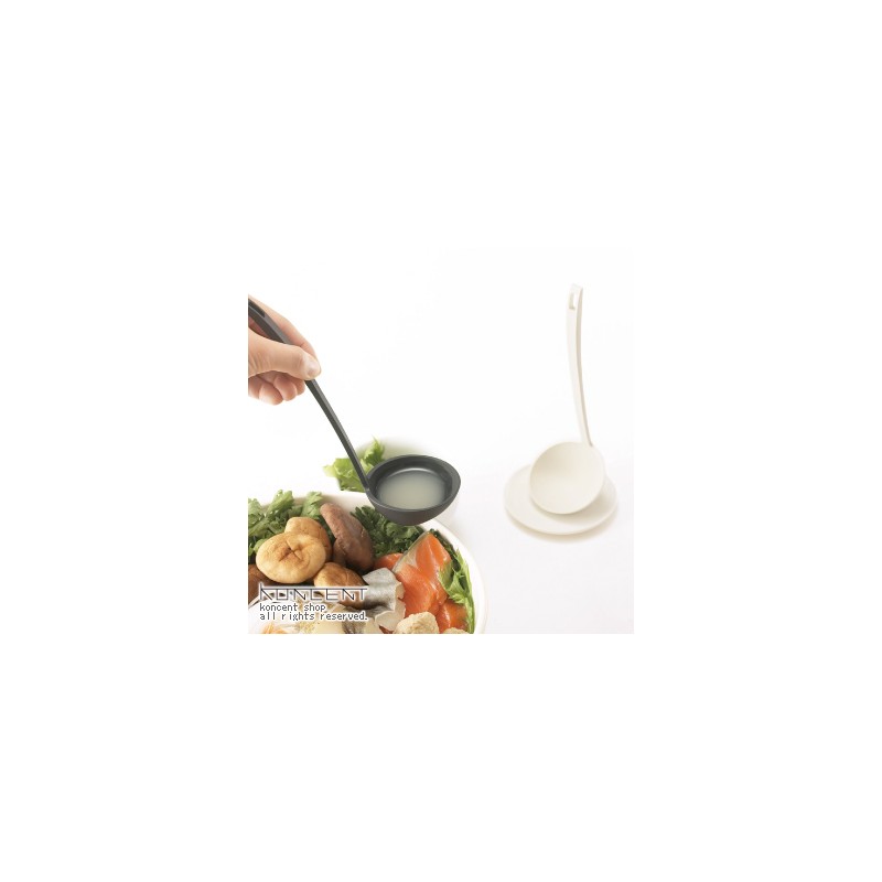 standing ladle with small tasting dish