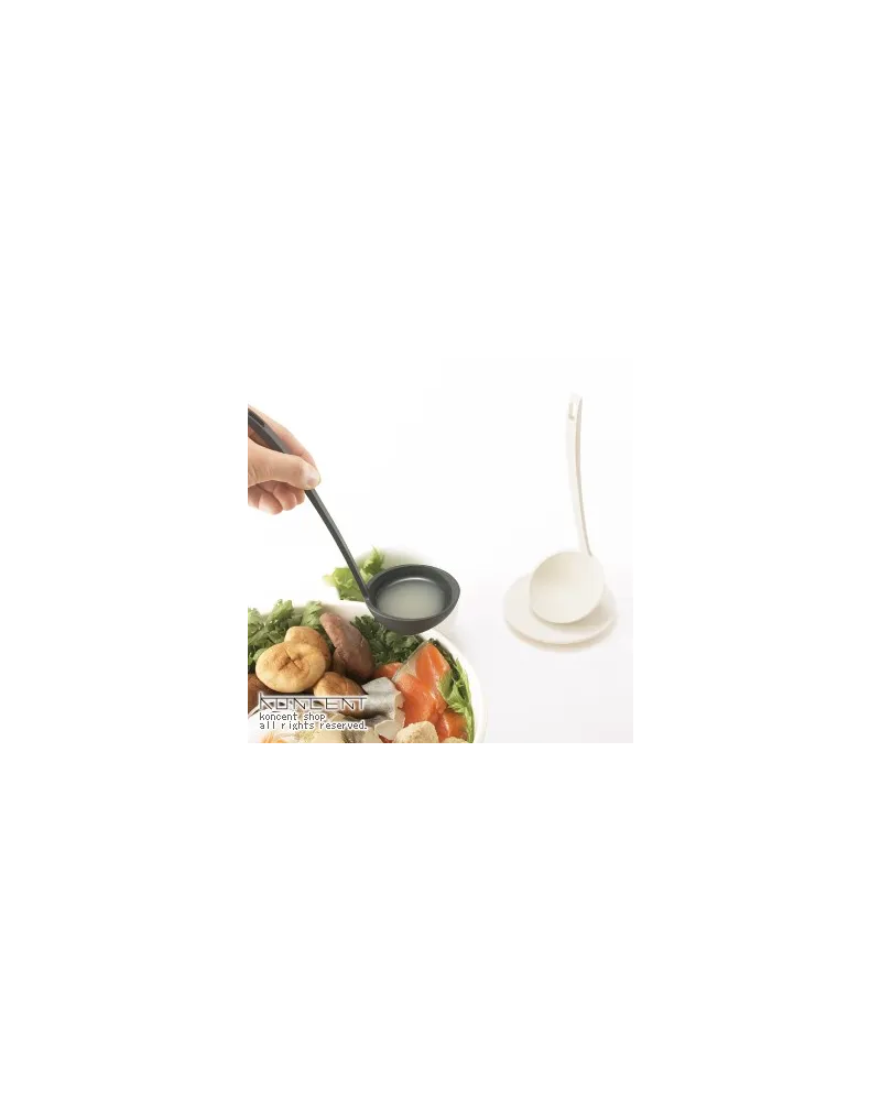 standing ladle with small tasting dish