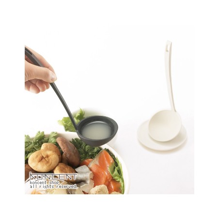 standing ladle with small tasting dish