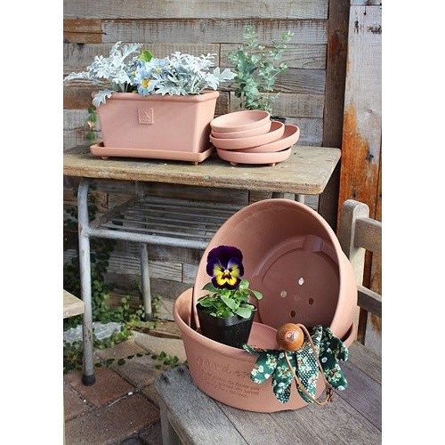 Plastic planter for garden and indoor use