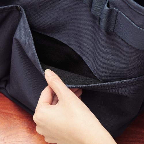Storage bag with brushed fabric delicate on the contents inside the external pockets