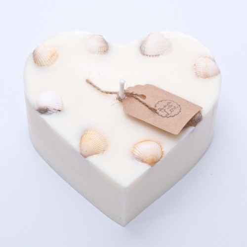 handmade soy wax candle in the shape of an ecological heart