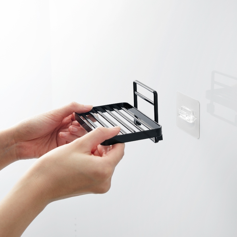 Bathroom soap tray with draining shelf